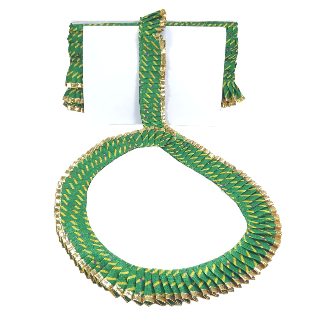 Green and gold necklace on a white background