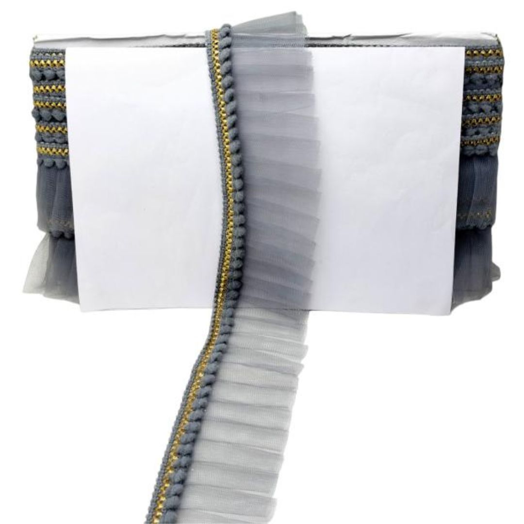 White pouch with gray and gold trim on a white background