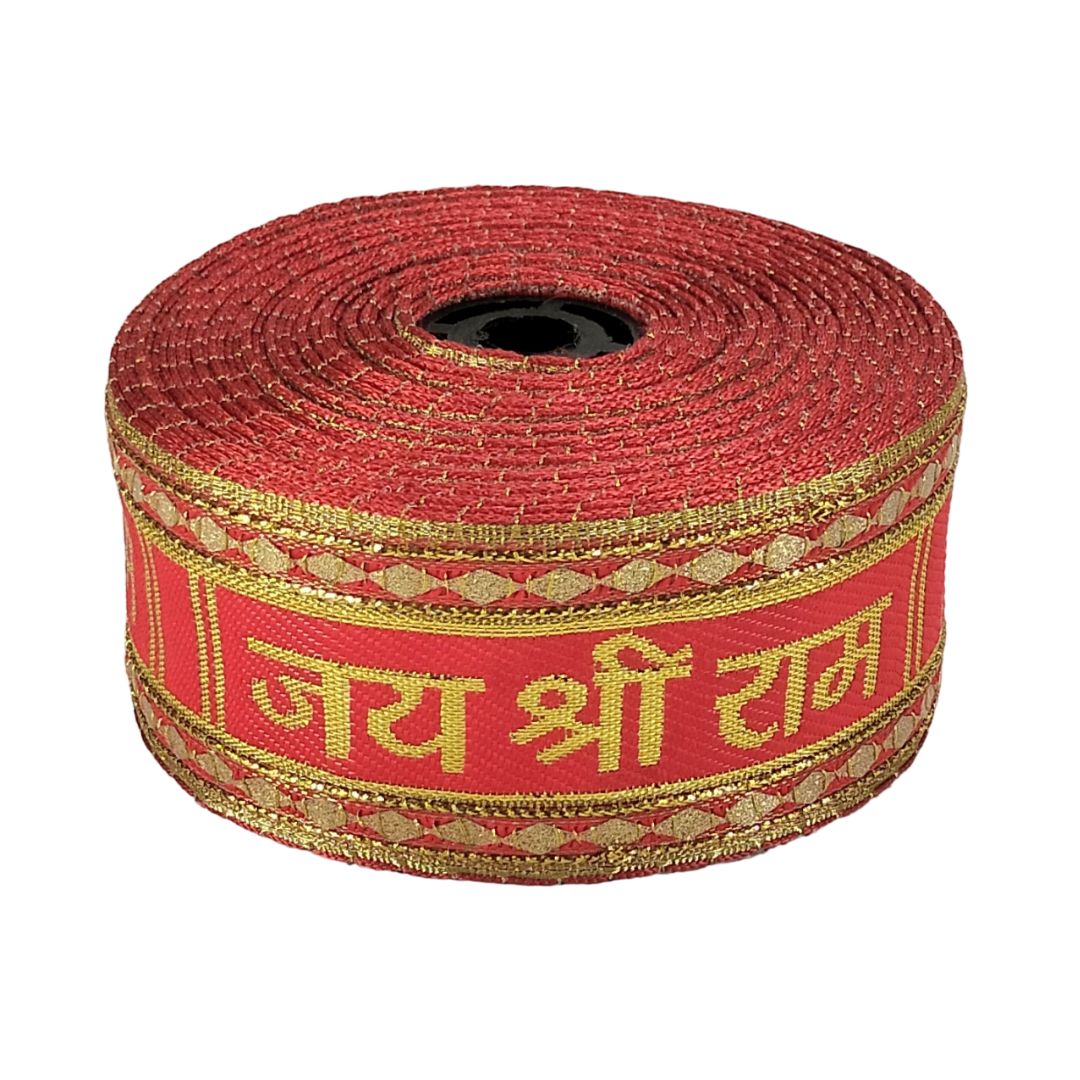 Red ribbon with gold text on a white background