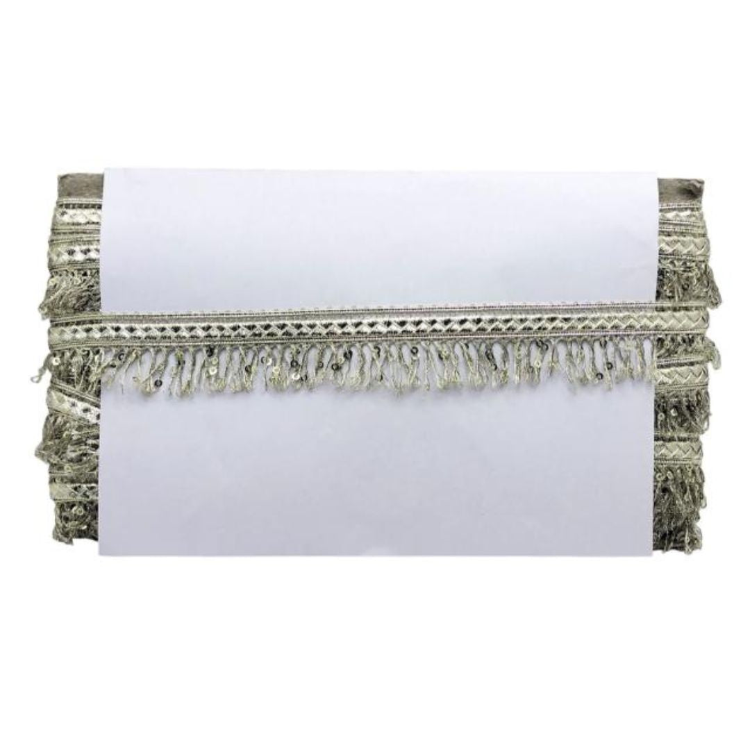 Decorative clutch with fringe details on a white background