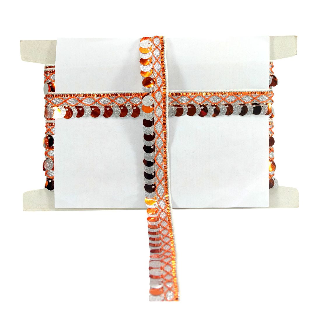 Decorative pillow with orange and brown pattern on a white background