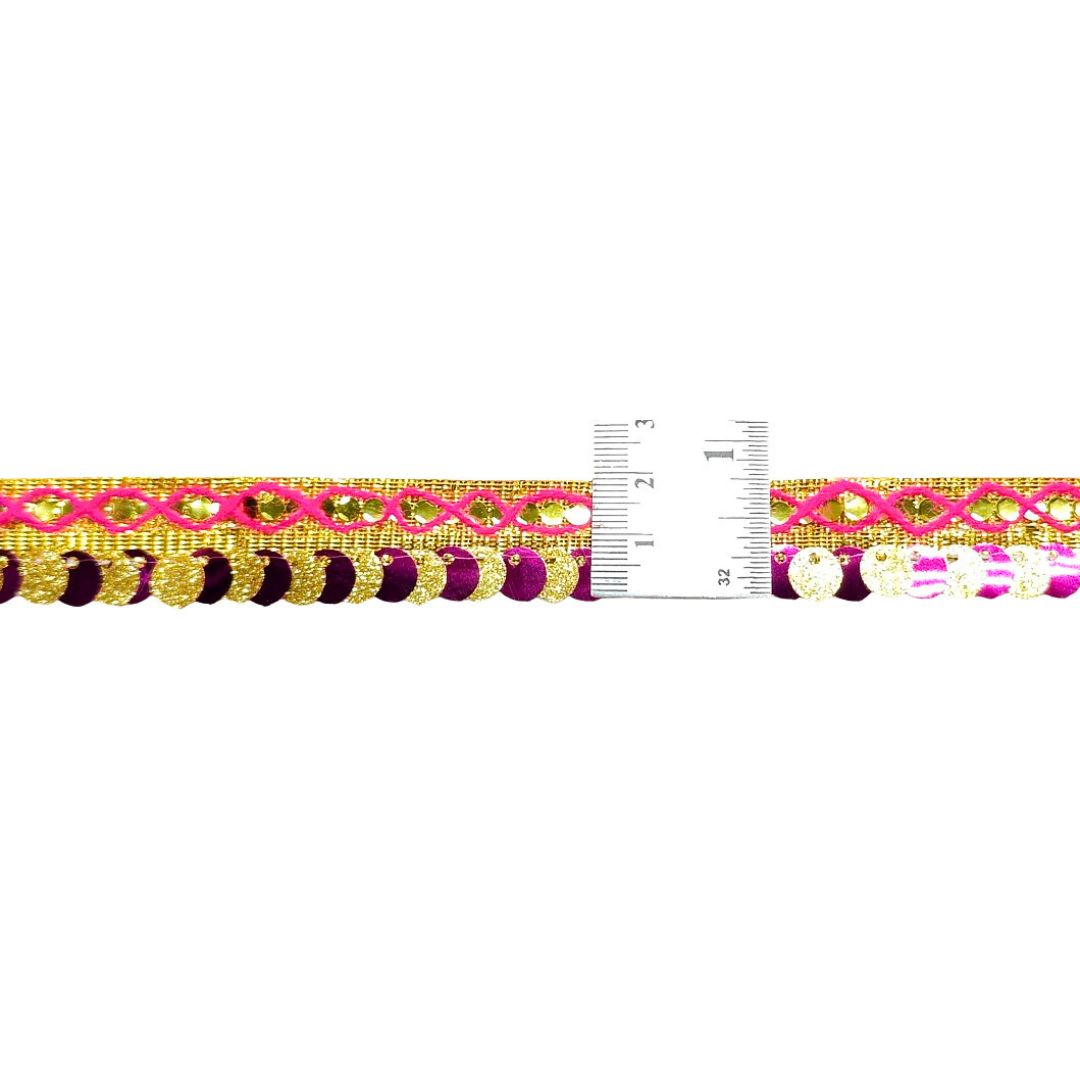 Decorative ribbon with a ruler for scale on a white background