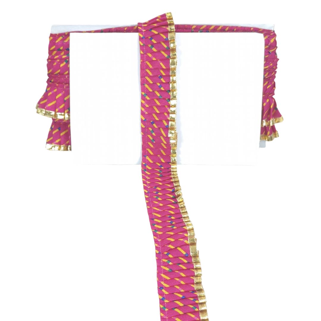 Pink and gold traditional garment on a white background