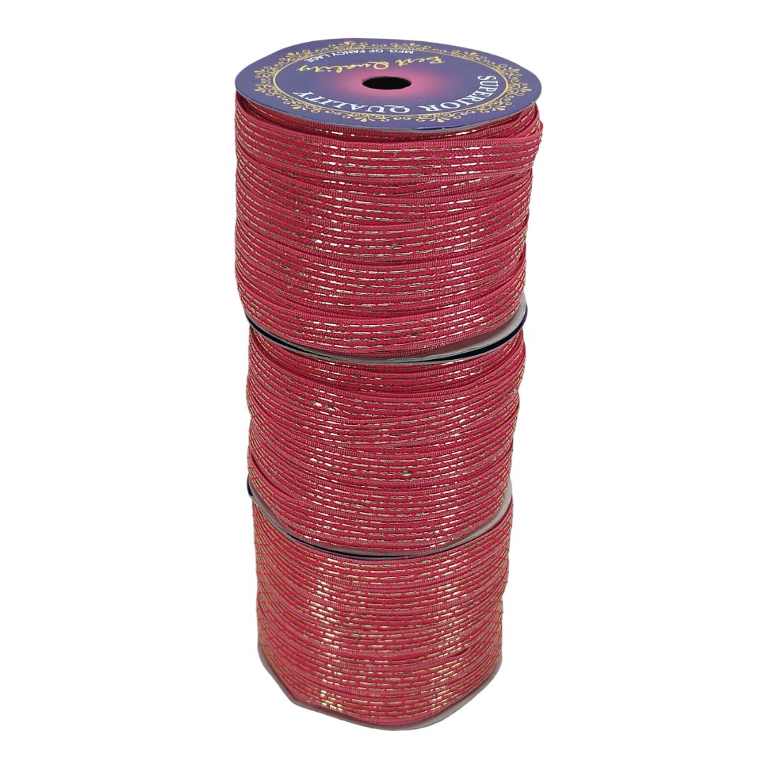 Stack of red spools with a blue label on a white background