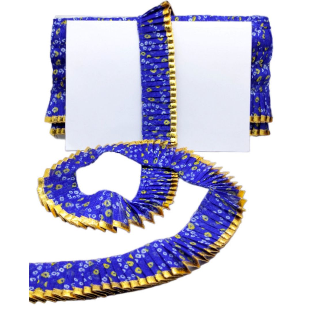 Blue and gold decorative fabric with a white background