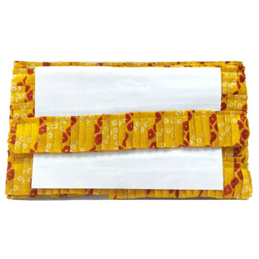 Yellow fabric wallet with red patterns on a white background