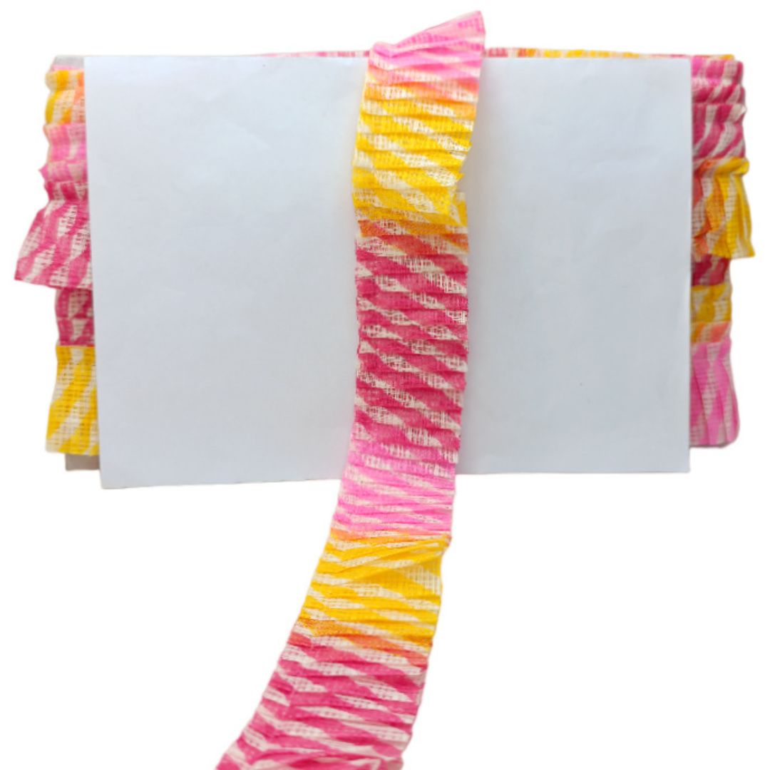 Colorful striped fabric with ruffled edges on a white background